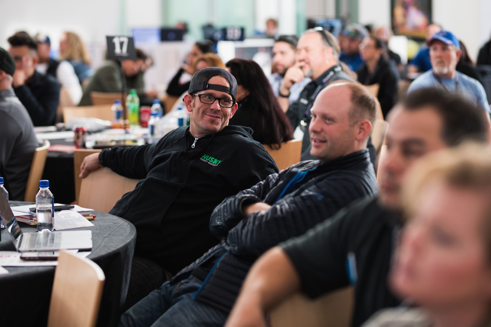 Pros gathered at tables during a Trades Thursday event
