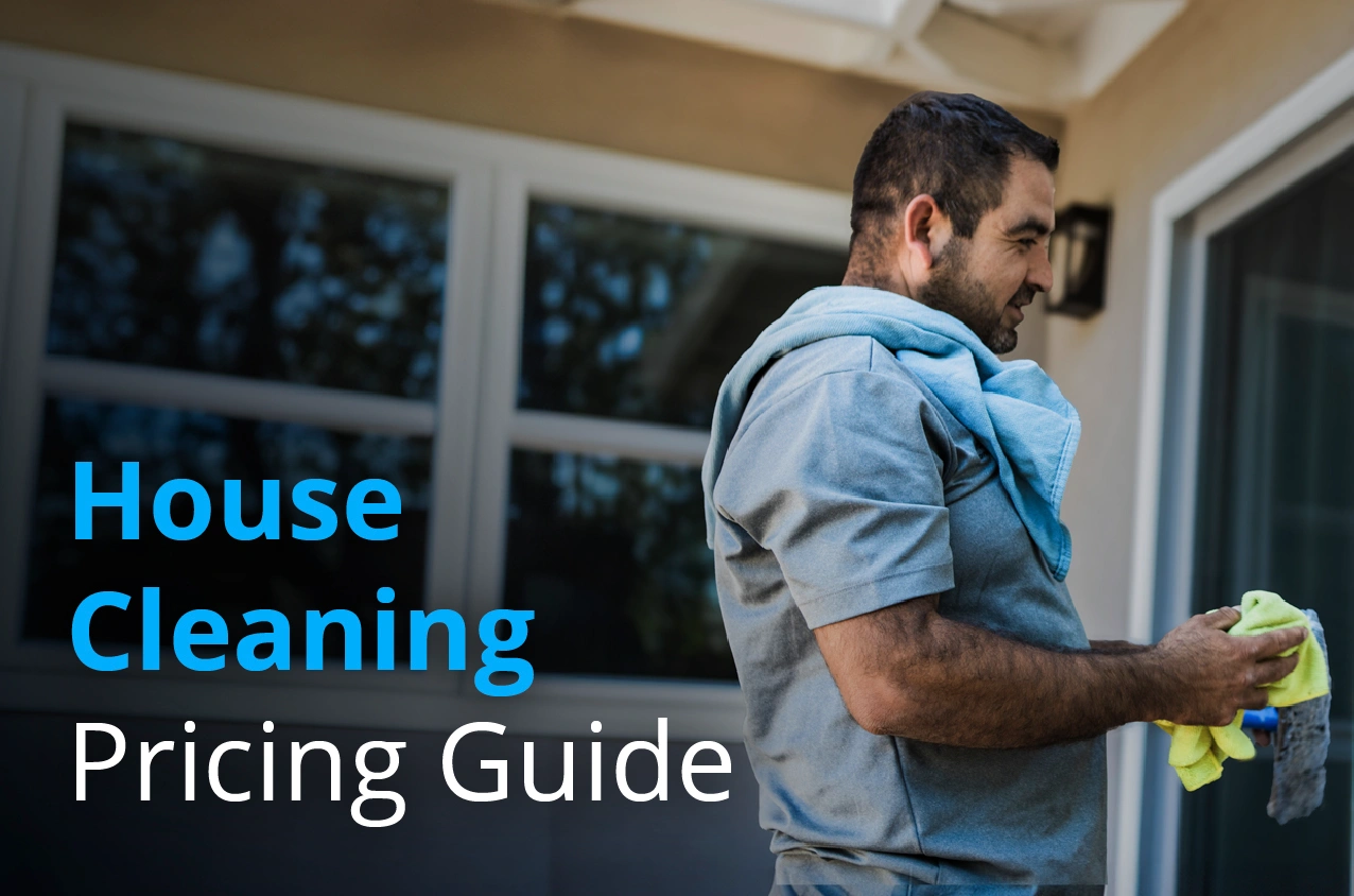 - Housecall Pro Male house cleaning pro using hand towels to dry his hands